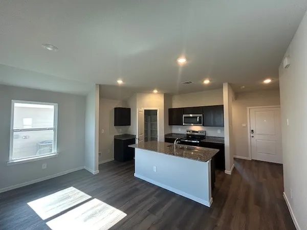 a view of a large garden with an outdoor space