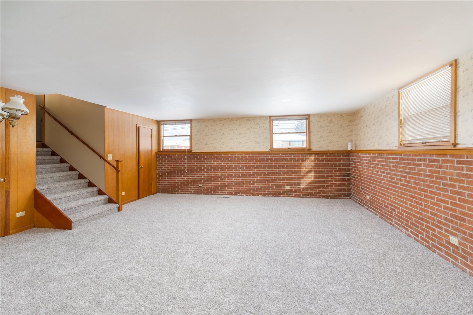 708 East Thompson Street Princeton, IL 61356 - Photo 17 of 46 a view of an empty room with stairs