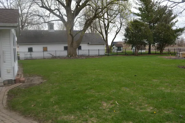 a view of roof and tree