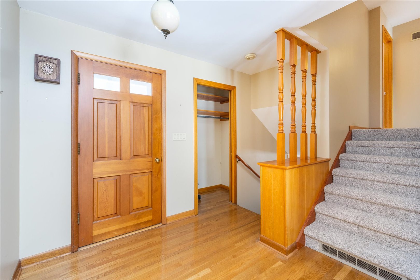 708 East Thompson Street Princeton, IL 61356 - Photo 6 of 46 a view of entryway with wooden floor and door