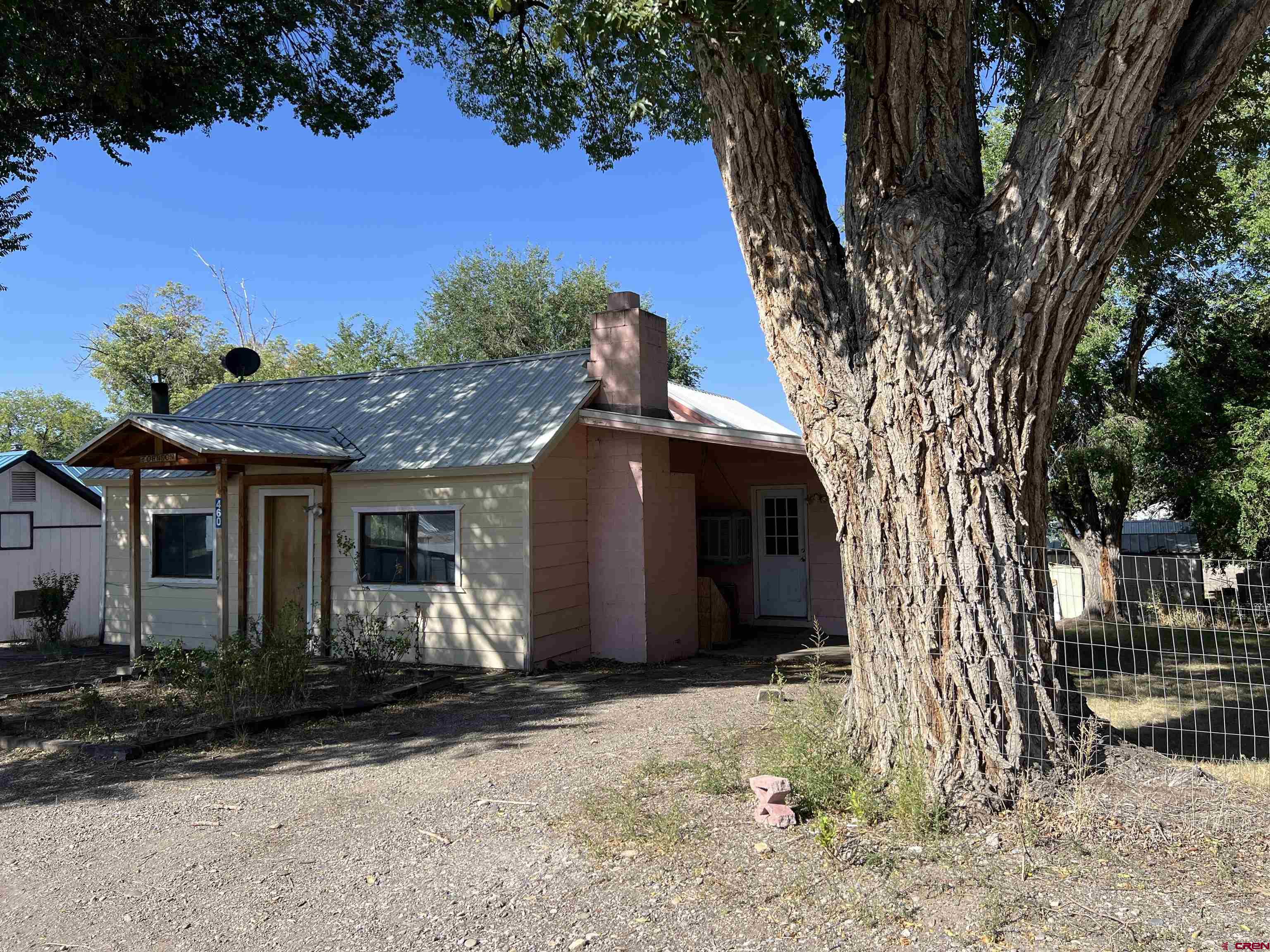 460 Fox Street Nucla, CO 81424 - Photo 5 of 35 a view of a house with a yard