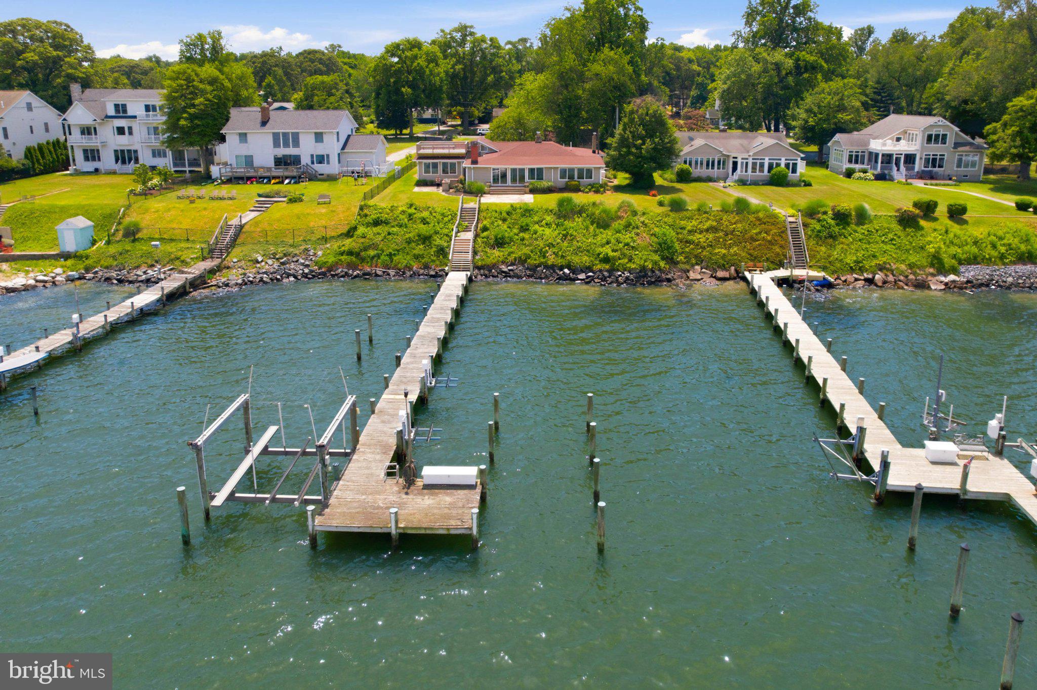 1100 River Bay Road Annapolis, MD 21409 - Photo 61 of 67 a view of a lake with a house swimming pool and outdoor space