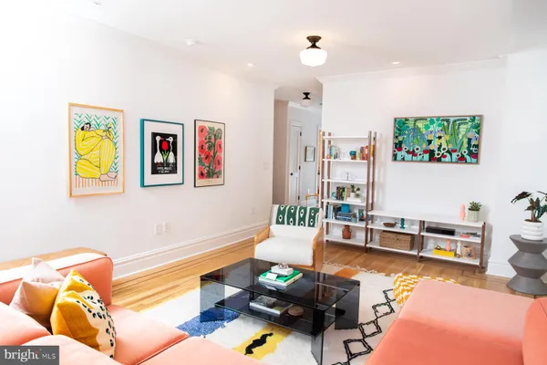 a living room with furniture pool and view of living room