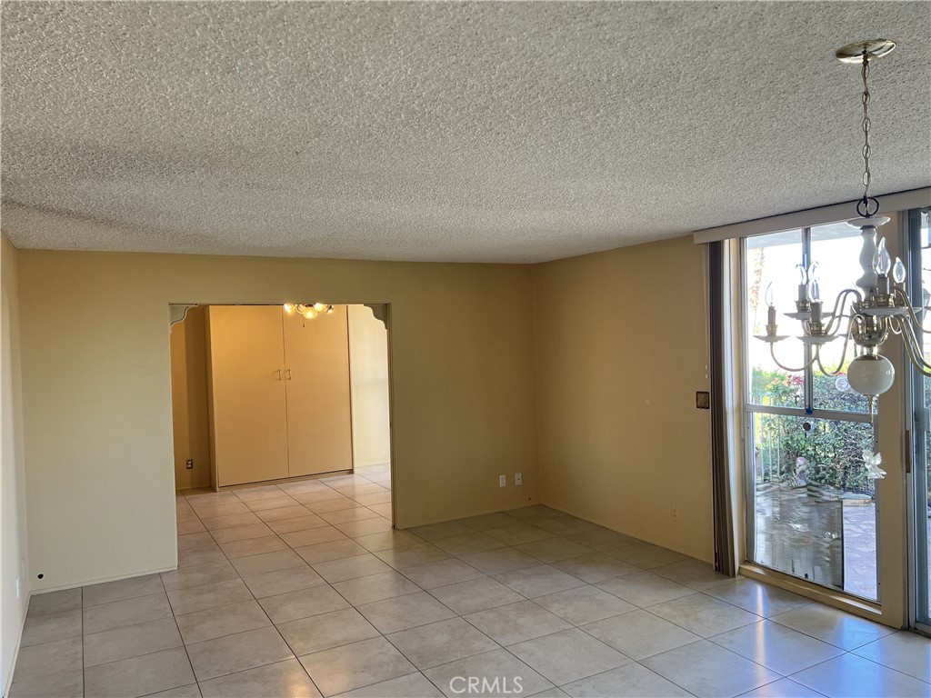 42278 Dunes View Road, Unit 28 Rancho Mirage, CA 92270 - Photo 16 of 57 an empty room with windows