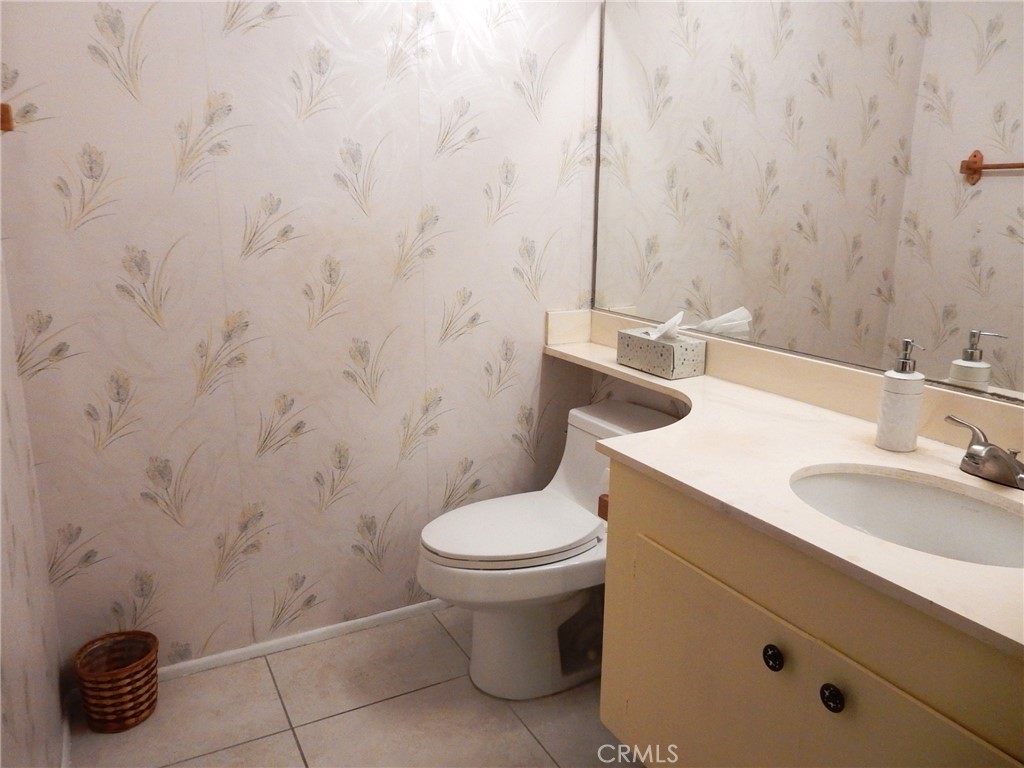 42278 Dunes View Road, Unit 28 Rancho Mirage, CA 92270 - Photo 23 of 57 a bathroom with a sink and a toilet