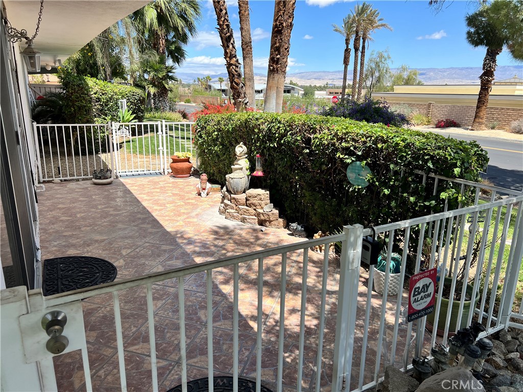 42278 Dunes View Road, Unit 28 Rancho Mirage, CA 92270 - Photo 29 of 57 Another front patio view looking West.