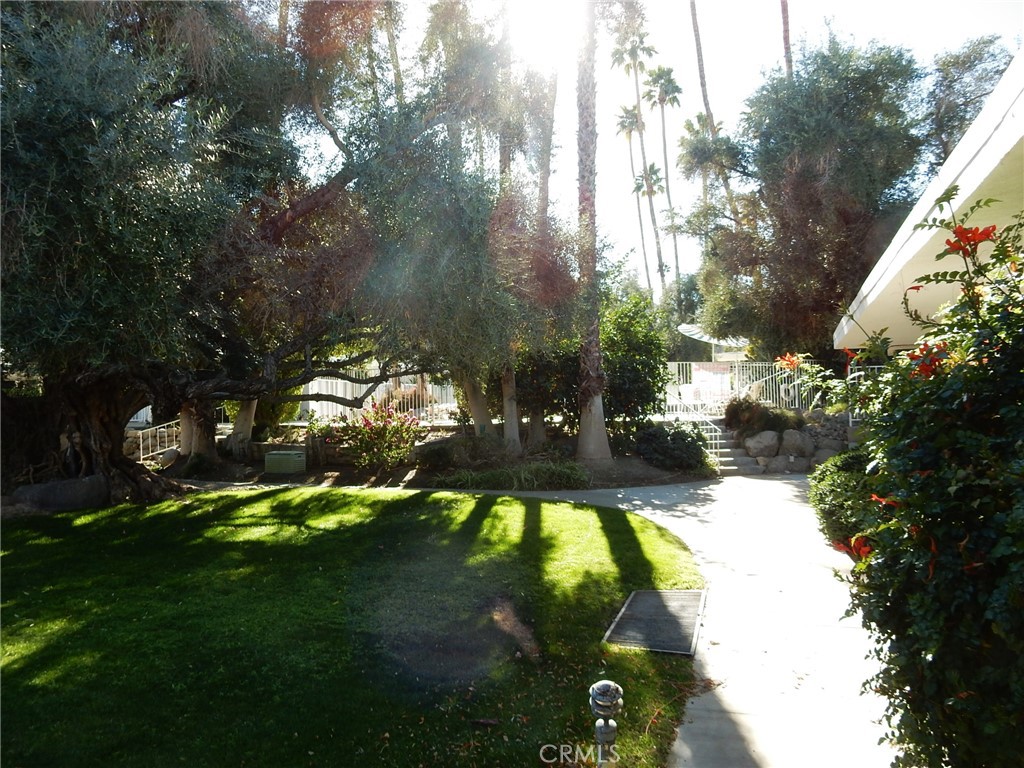 42278 Dunes View Road, Unit 28 Rancho Mirage, CA 92270 - Photo 55 of 57 Walkway from 28 towards the pool.