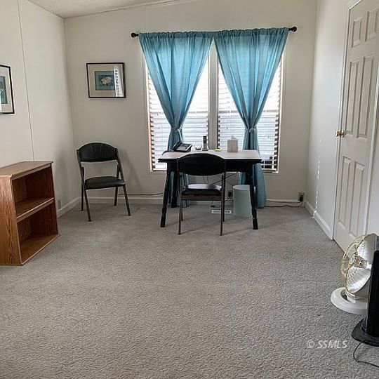 208 Charity Road Caliente, CA 93518 - Photo 18 of 47 a workspace with furniture and a window