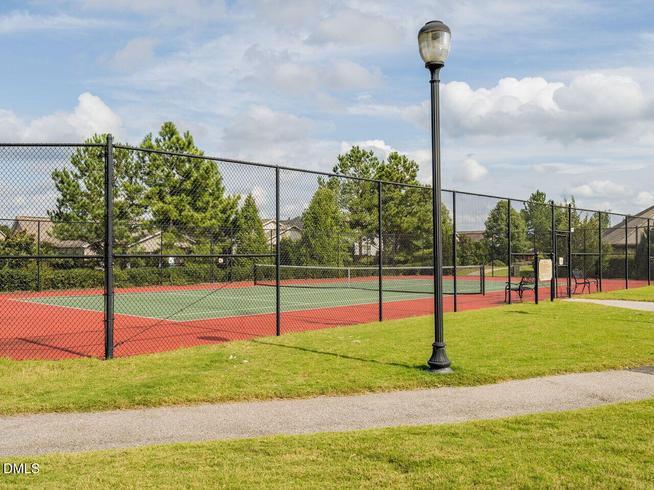 8215 Yaxley Hall Drive Raleigh, NC 27616 - Photo 39 of 42 a view of a park with swings