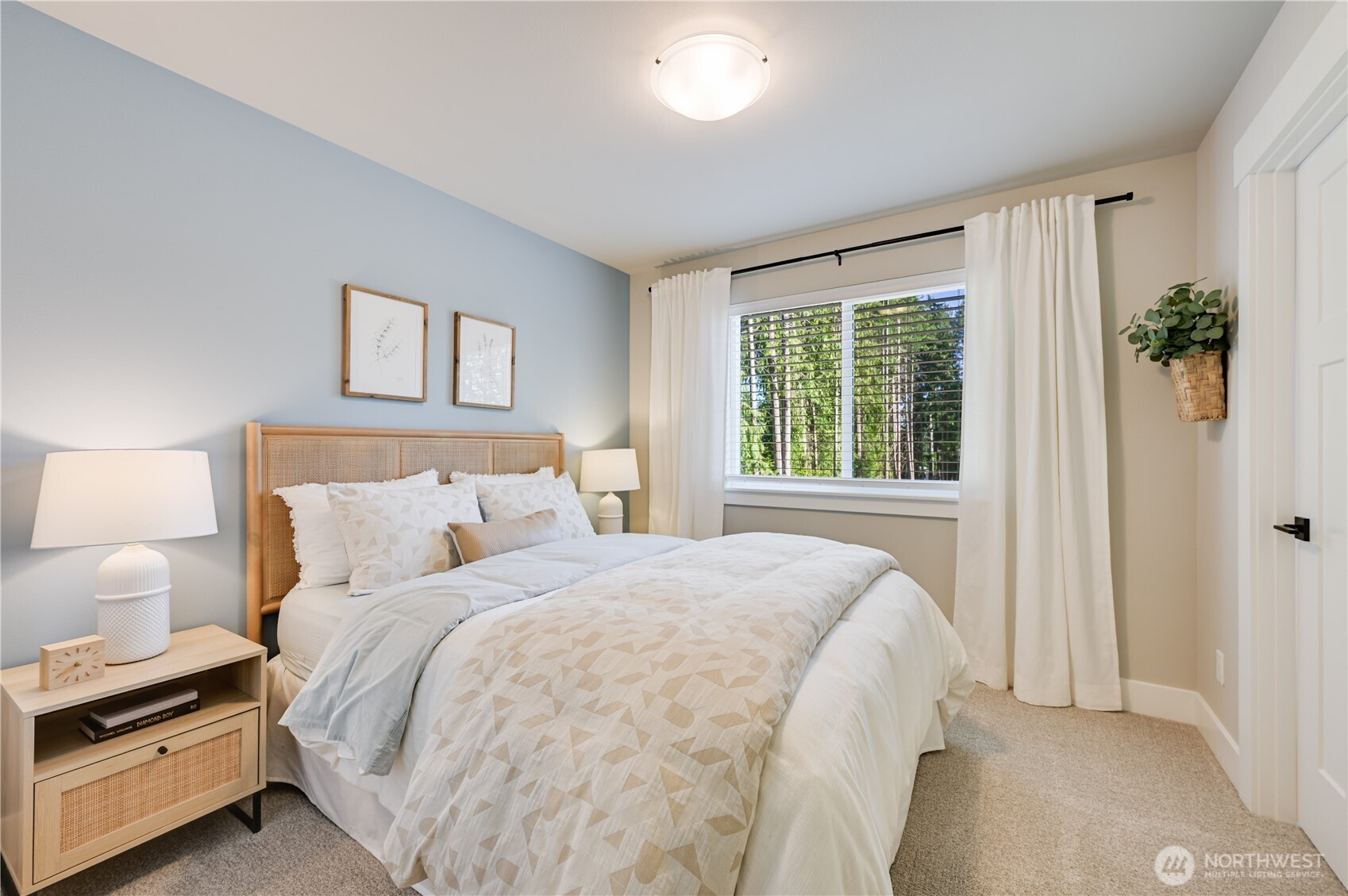 19216 Meridian Drive Southeast, Unit CW 07 Bothell, WA 98012 - Photo 22 of 37 a bedroom with a bed and a window