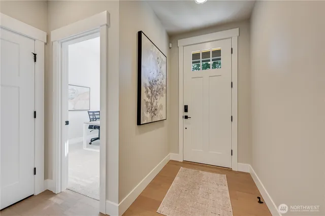 a view of a hallway with closet area