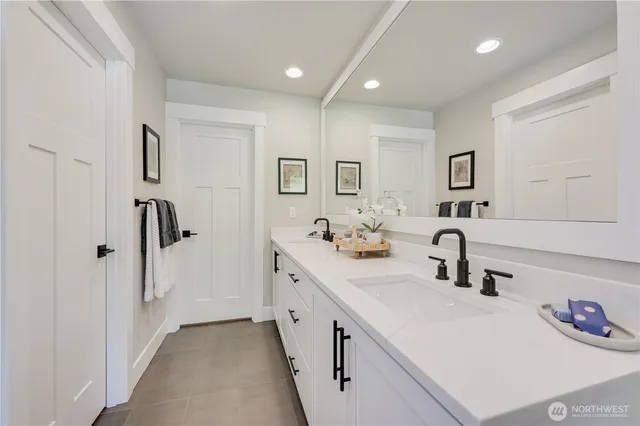 a kitchen with a sink and a refrigerator