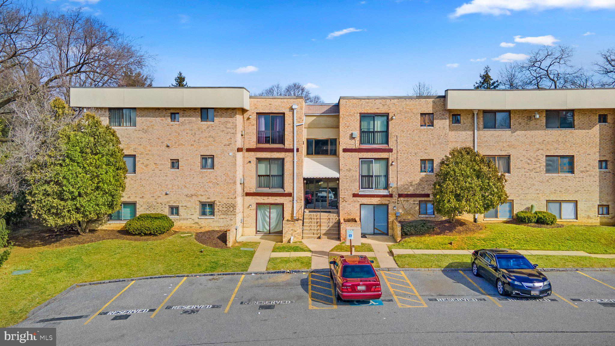 3928 Rolling Rd., Unit C9 Pikesville, MD 21208 - Photo 1 of 23 a view of a swimming pool with a patio