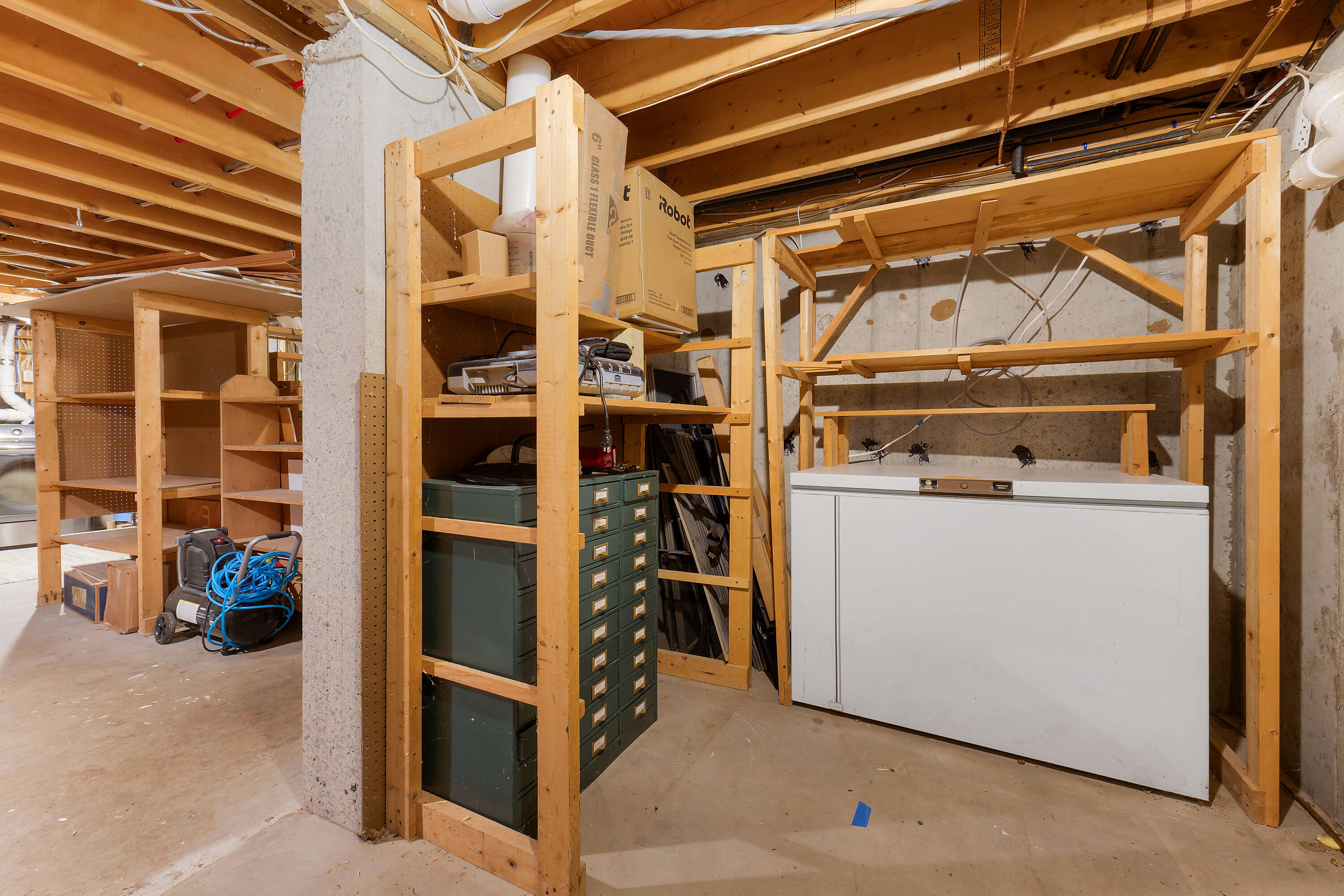 2 Harbor Ridge Road Freeport, ME 04032 - Photo 27 of 39 basement side storage room with chest fr