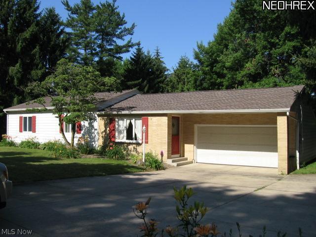 461 Howland Wilson Road Northeast Warren, OH 44484 - Photo 1 of 13 Front of house -- 2 car attached garage; oversized concrete drive goes behind house to 2nd garage