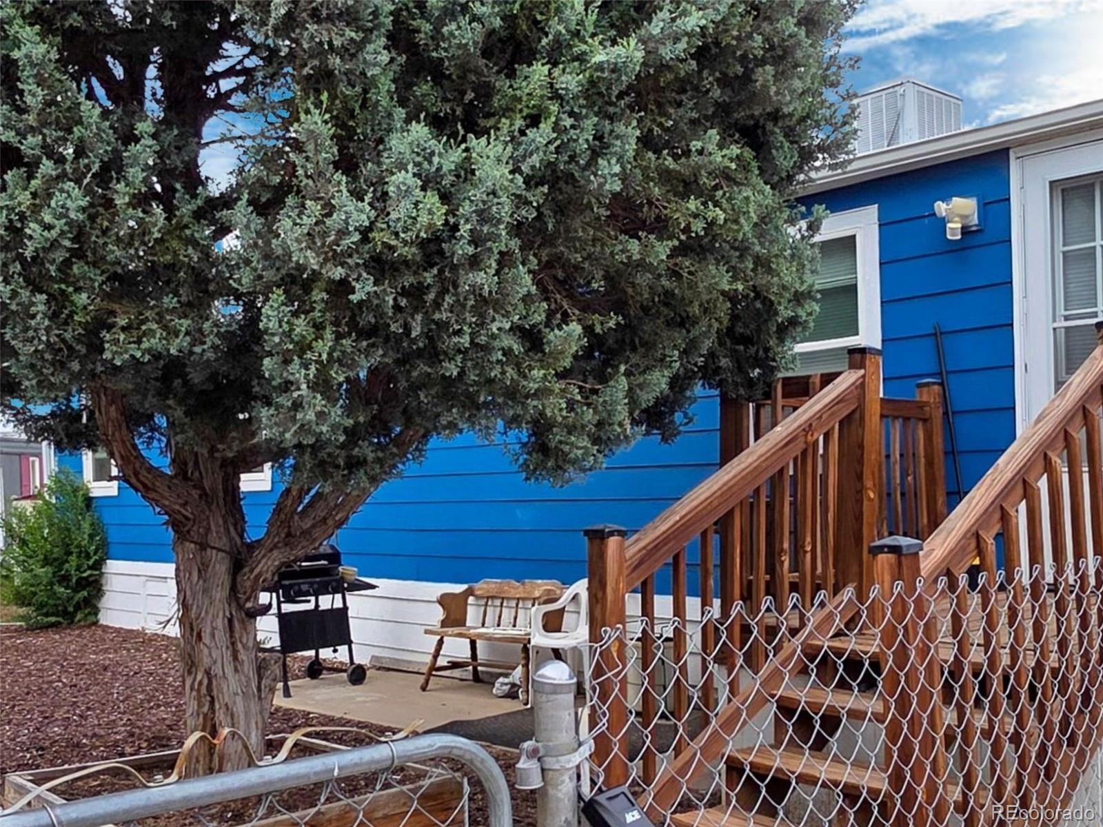 1401 9th Street Fort Lupton, CO 80621 - Photo 4 of 17 a view of deck with patio