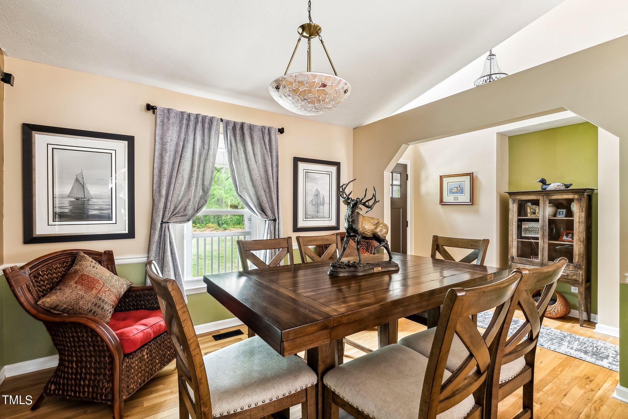 30341 East E Lake Rd Road Wagram, NC 28396 - Photo 13 of 39 a view of a dining room with furniture and window