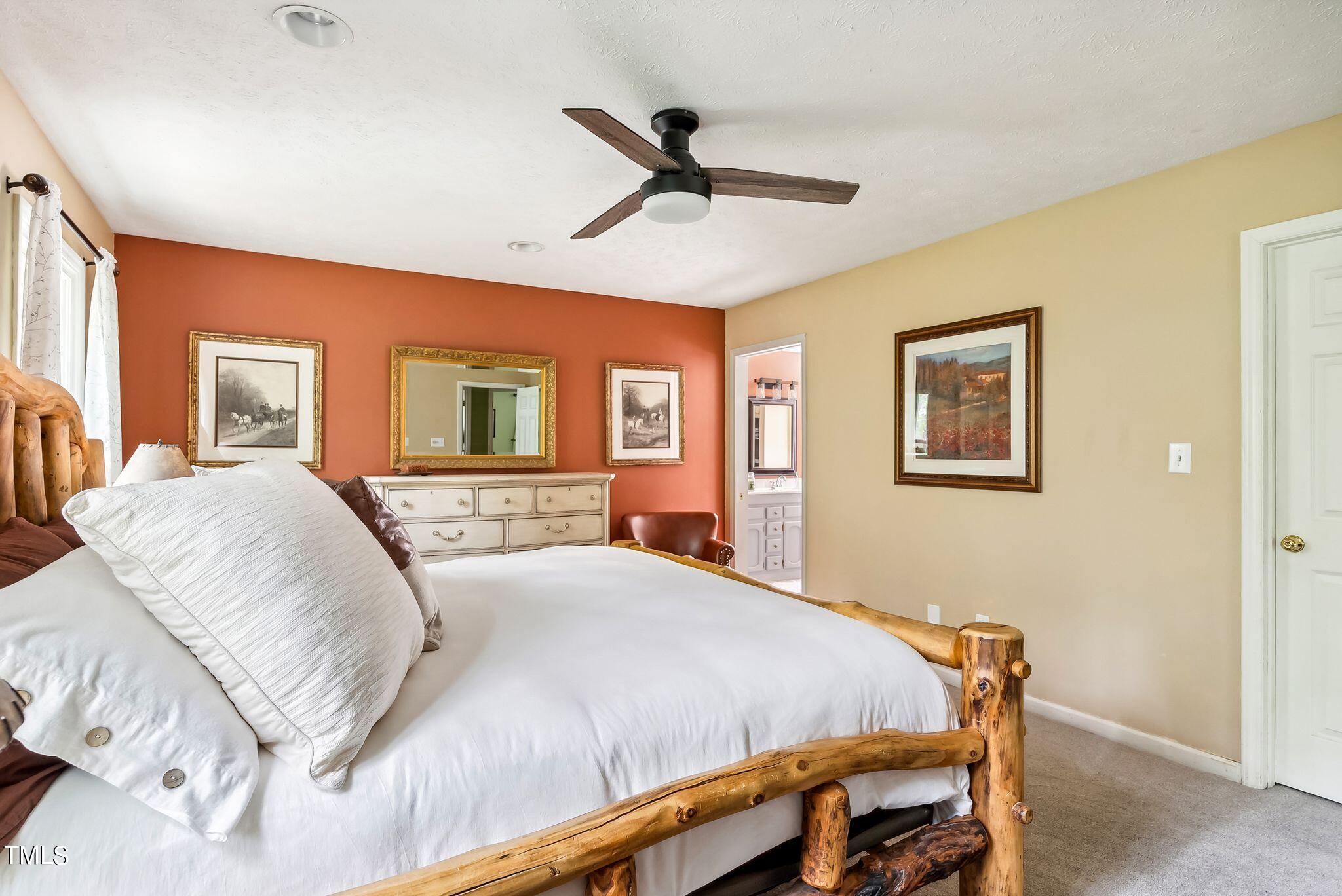 30341 East E Lake Rd Road Wagram, NC 28396 - Photo 17 of 39 a bedroom with a bed and window