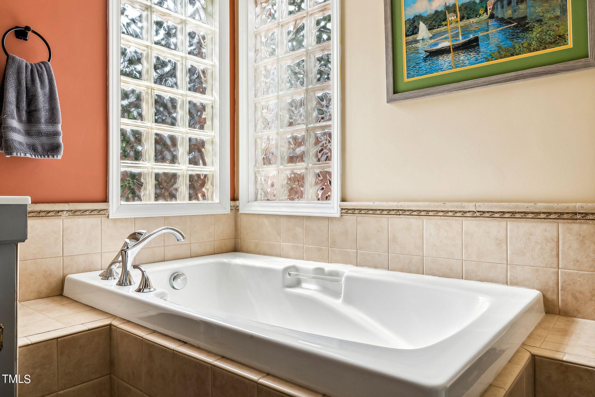 30341 East E Lake Rd Road Wagram, NC 28396 - Photo 21 of 39 a bathroom with a sink and a window