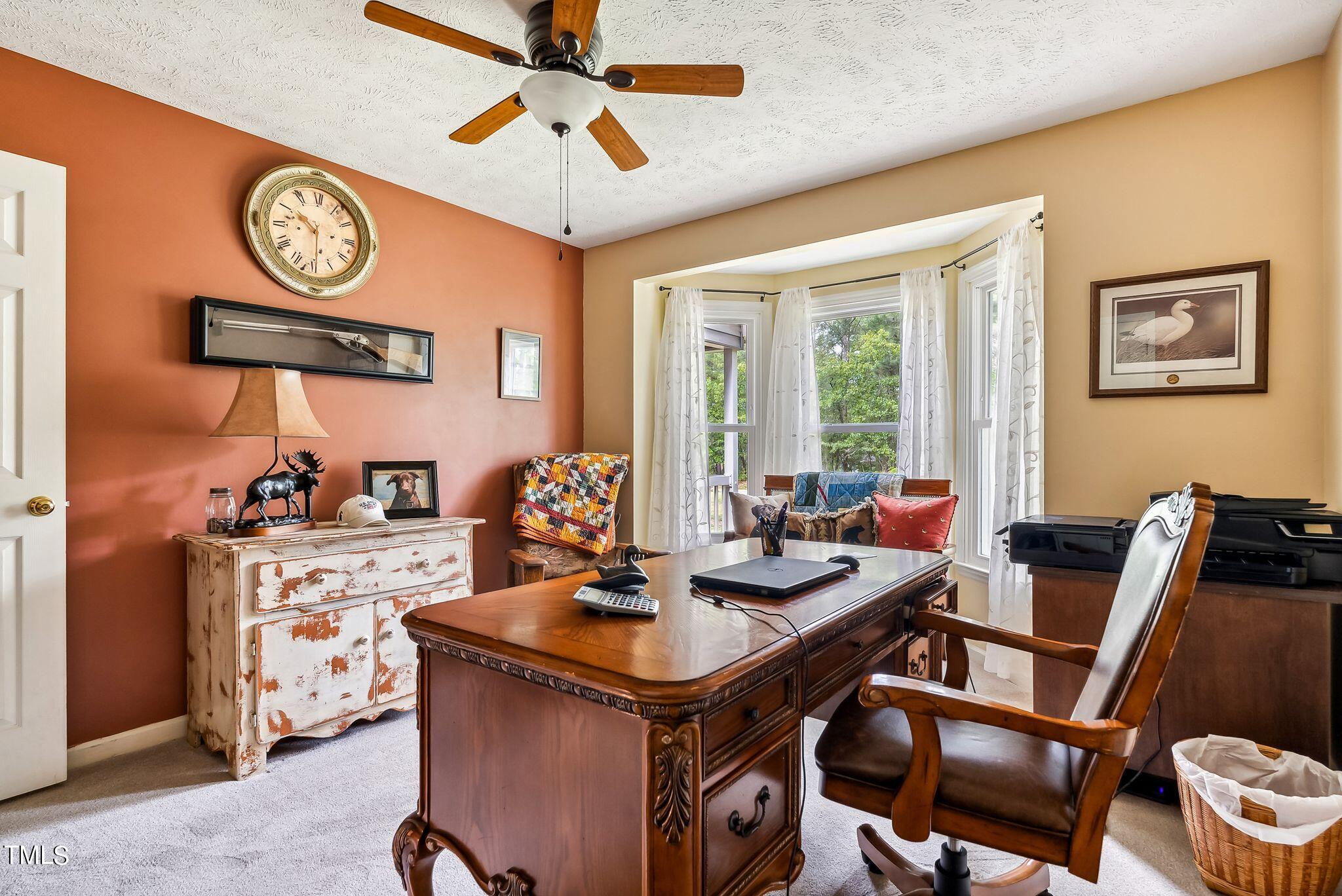 30341 East E Lake Rd Road Wagram, NC 28396 - Photo 23 of 39 a view of a dining room with furniture window and wooden floor