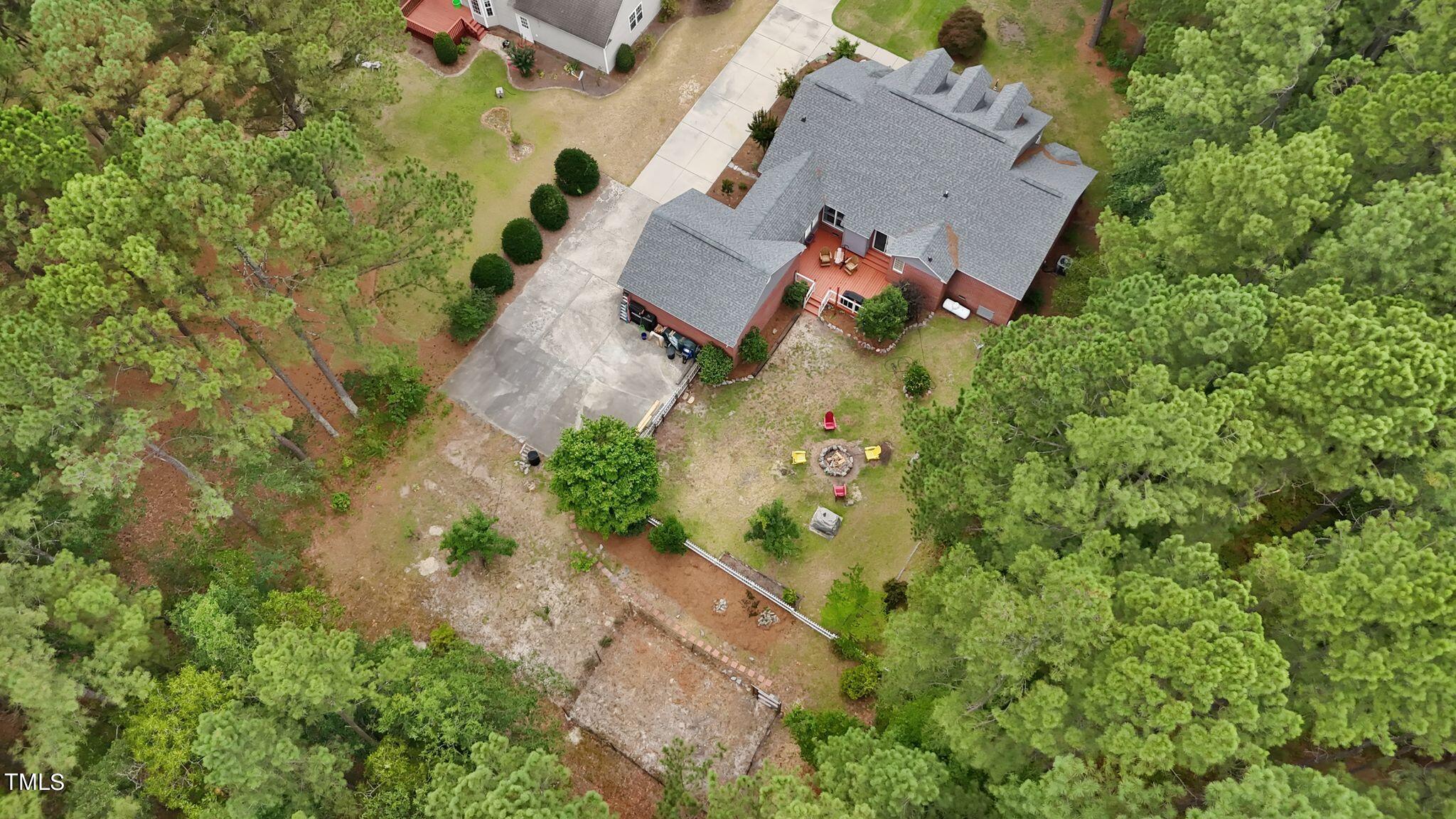 30341 East E Lake Rd Road Wagram, NC 28396 - Photo 37 of 39 an aerial view of a house with a yard