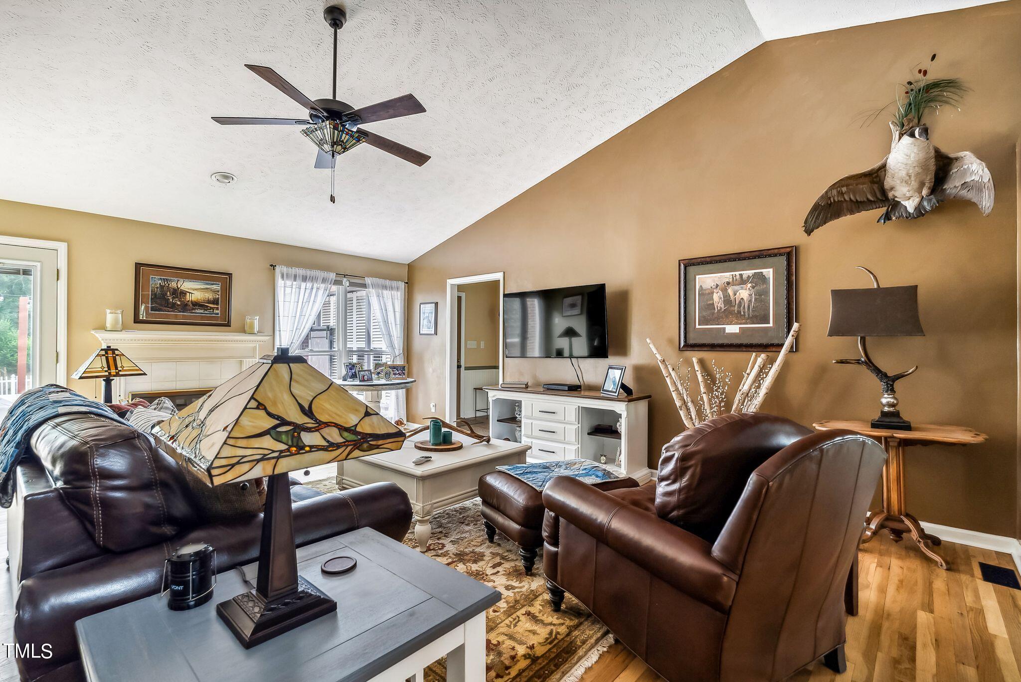30341 East E Lake Rd Road Wagram, NC 28396 - Photo 4 of 39 a view of a livingroom with workspace and a couch
