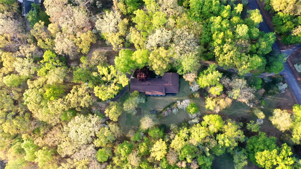 139 Todds Creek Road Central, SC 29630 - Photo 28 of 45 Perched amidst a verdant landscape, this aerial view highlights a home nestled in nature's embrace.