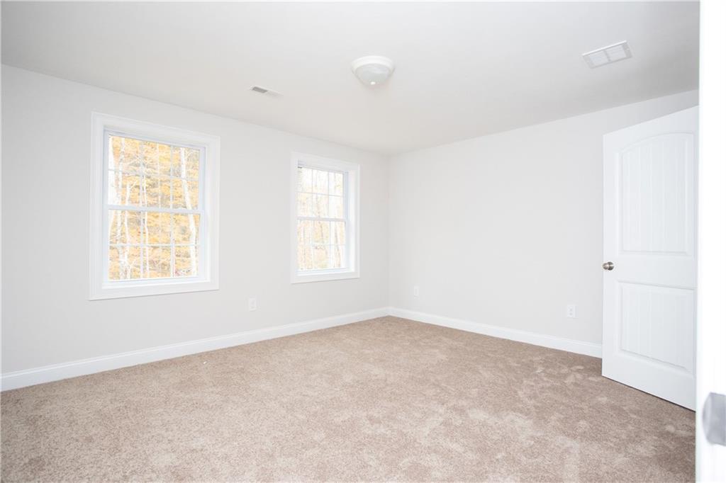 7 Great Pasture Road Cape Neddick, ME 03902 - Photo 22 of 34 Bedroom 3 overlooks the wooded front...