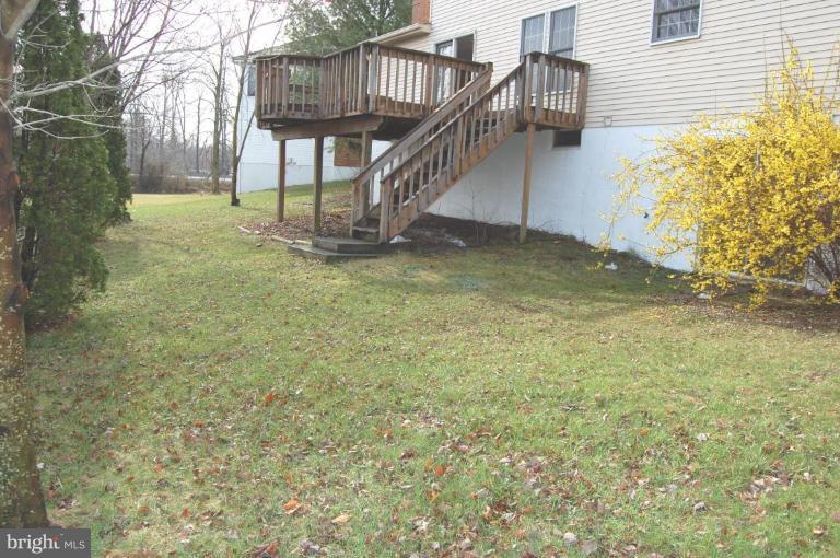 12600 Bridoon Lane Reston, VA 20191 - Photo 2 of 25 a view of an house with backyard and trees