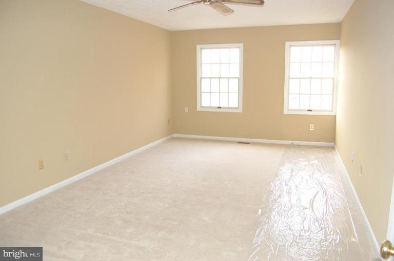 12600 Bridoon Lane Reston, VA 20191 - Photo 19 of 25 an empty room with windows