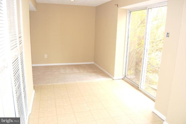 12600 Bridoon Lane Reston, VA 20191 - Photo 3 of 25 a view of an empty room and window