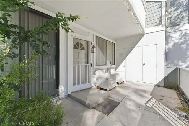 a white bath tub sitting in a spacious bedroom