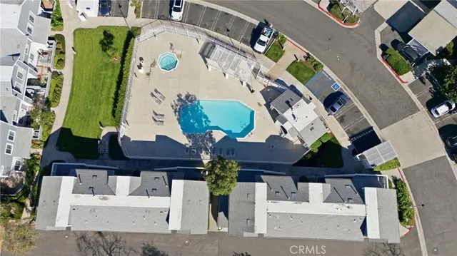 an aerial view of a city with lots of residential buildings