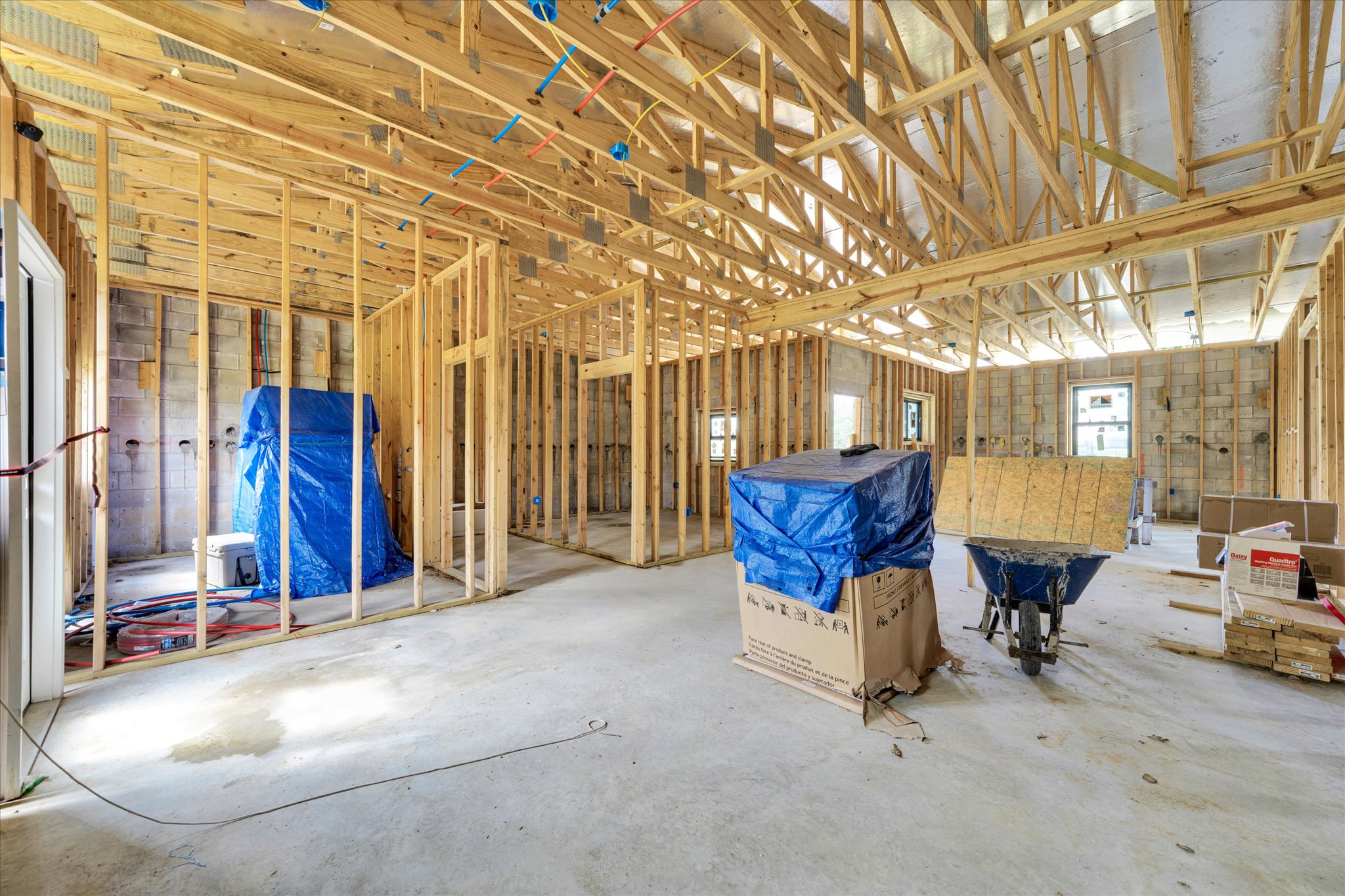 2755 Washburn Road Luling, TX 78648 - Photo 26 of 40 Framed walls and concrete floors highlight the potential of this developing interior space.