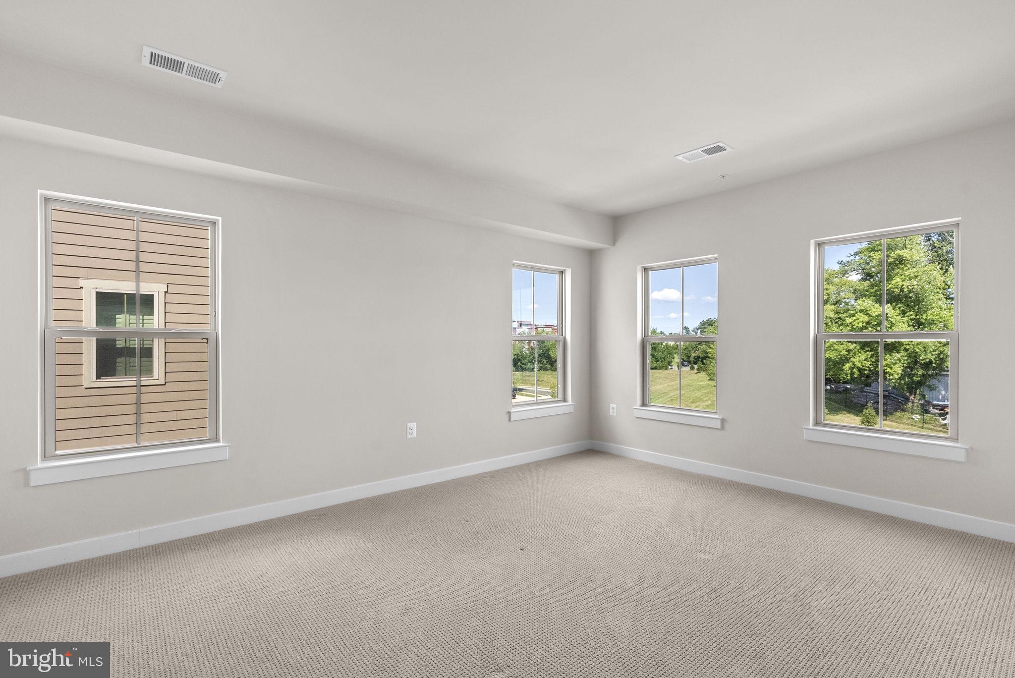 3520 Starlight Street, Unit 302 Frederick, MD 21704 - Photo 16 of 42 a view of an empty room with a window
