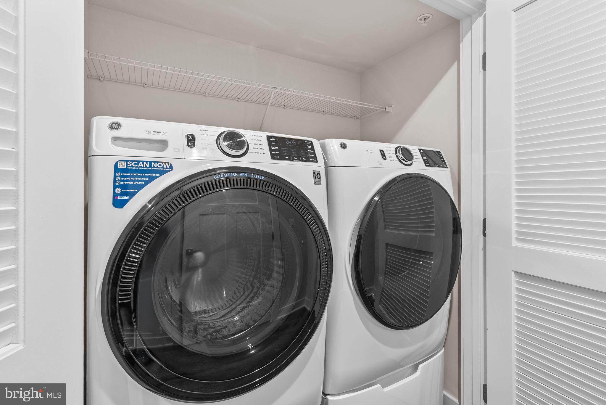 3520 Starlight Street, Unit 302 Frederick, MD 21704 - Photo 24 of 42 a utility room with dryer and washer