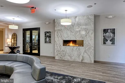 a outdoor dining space with furniture and window