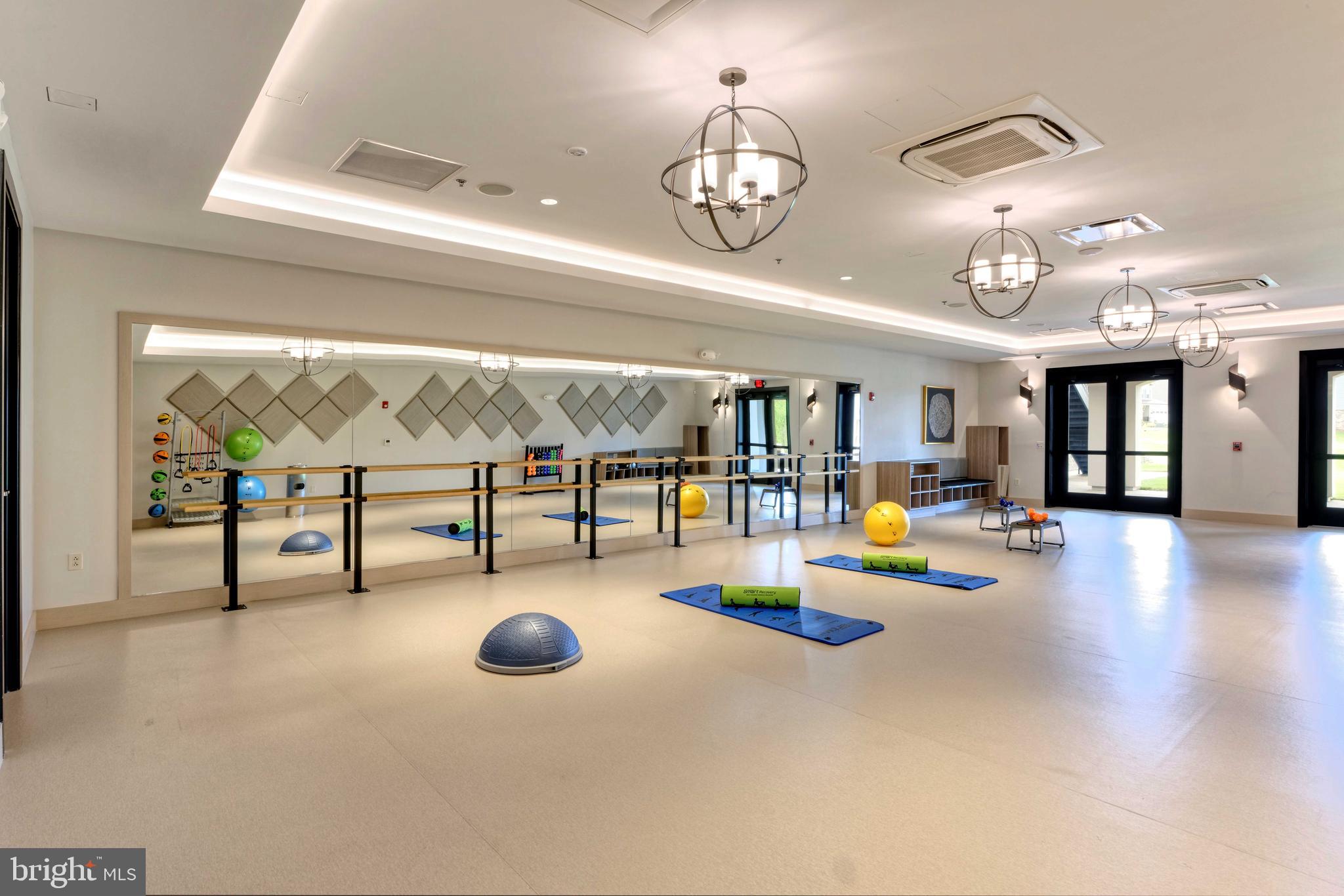 3520 Starlight Street, Unit 302 Frederick, MD 21704 - Photo 39 of 42 a view of a room with gym equipment