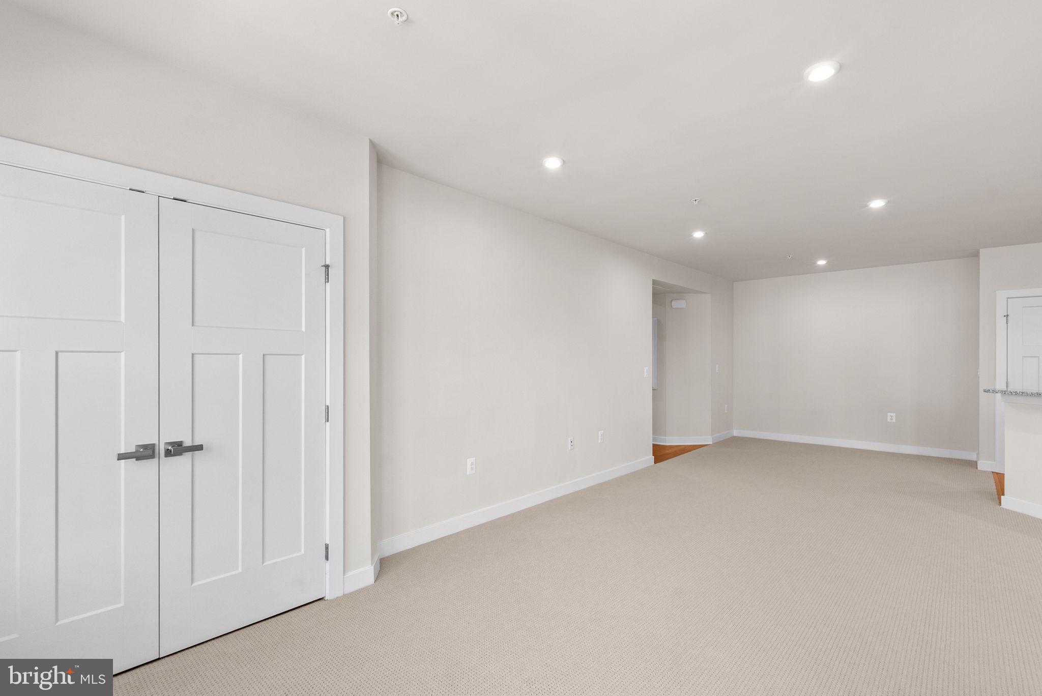 3520 Starlight Street, Unit 302 Frederick, MD 21704 - Photo 5 of 42 a view of an empty room