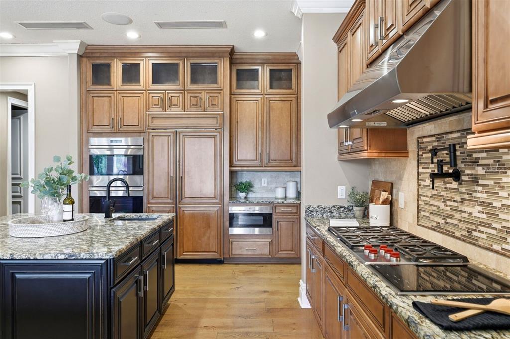 855 Southeast 87th Street Ocala, FL 34480 - Photo 20 of 79 a kitchen with stainless steel appliances granite countertop a stove and a refrigerator