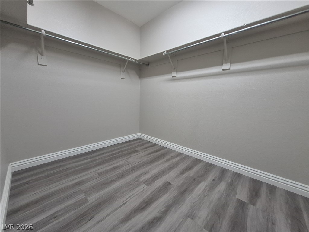 2053 Quarry Ridge Street, Unit 201 Las Vegas, NV 89117 - Photo 6 of 21 Ample hanging space and durable flooring await in this organized closet.