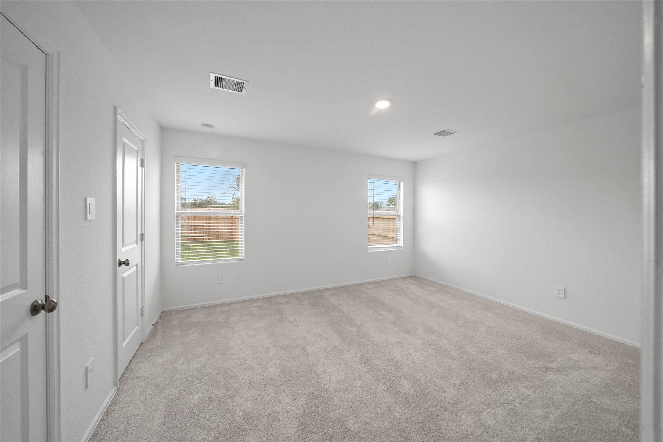 1440 Las Cuevas Drive Conroe, TX 77301 - Photo 15 of 25 an empty room with windows