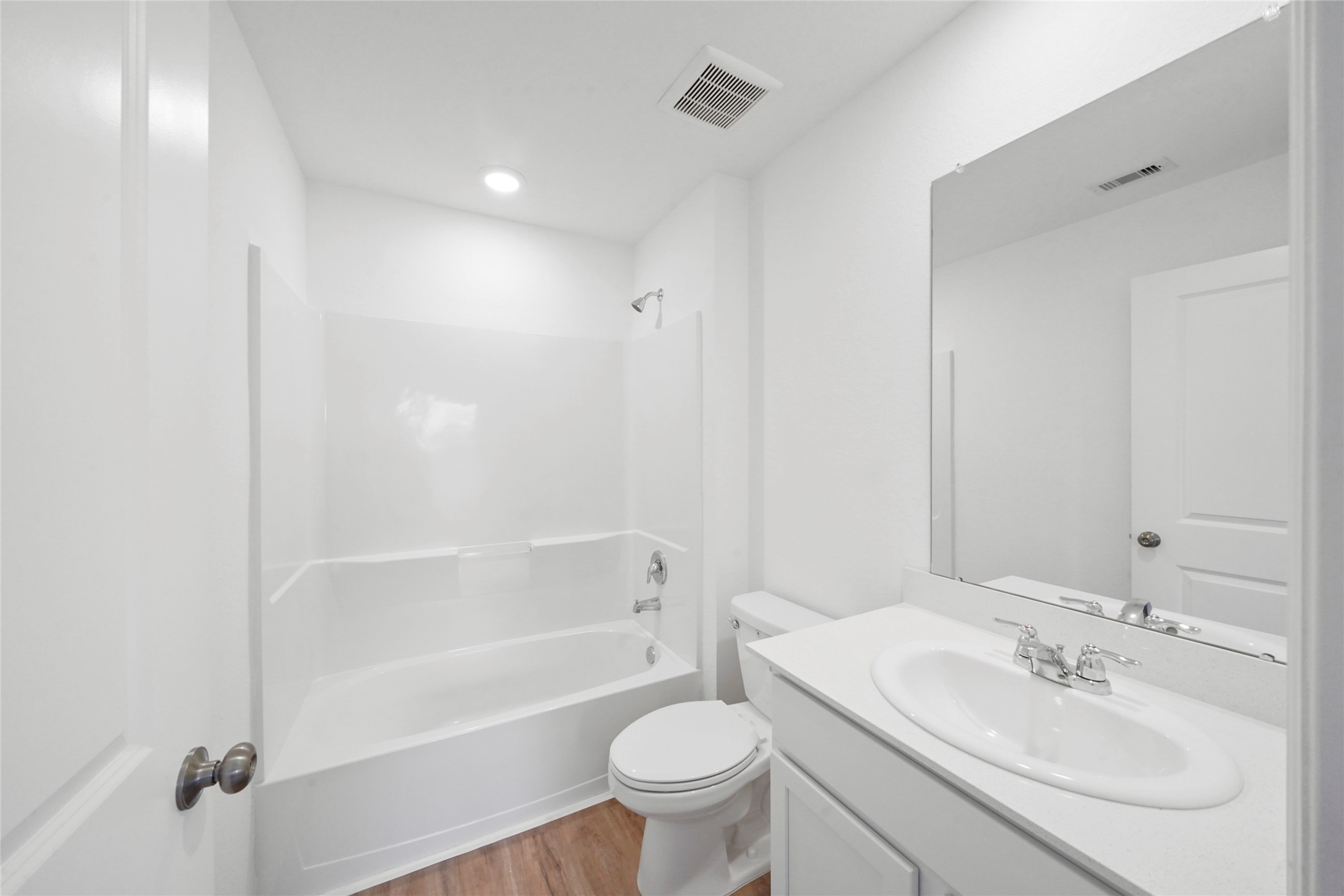 1440 Las Cuevas Drive Conroe, TX 77301 - Photo 20 of 25 a bathroom with a sink toilet tub vanity and shower