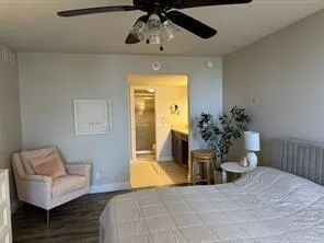 a view of a livingroom with furniture and cabinet