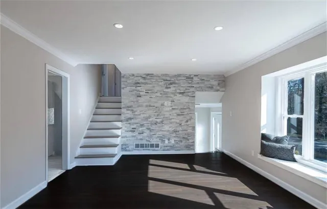 a view of entryway with stairs