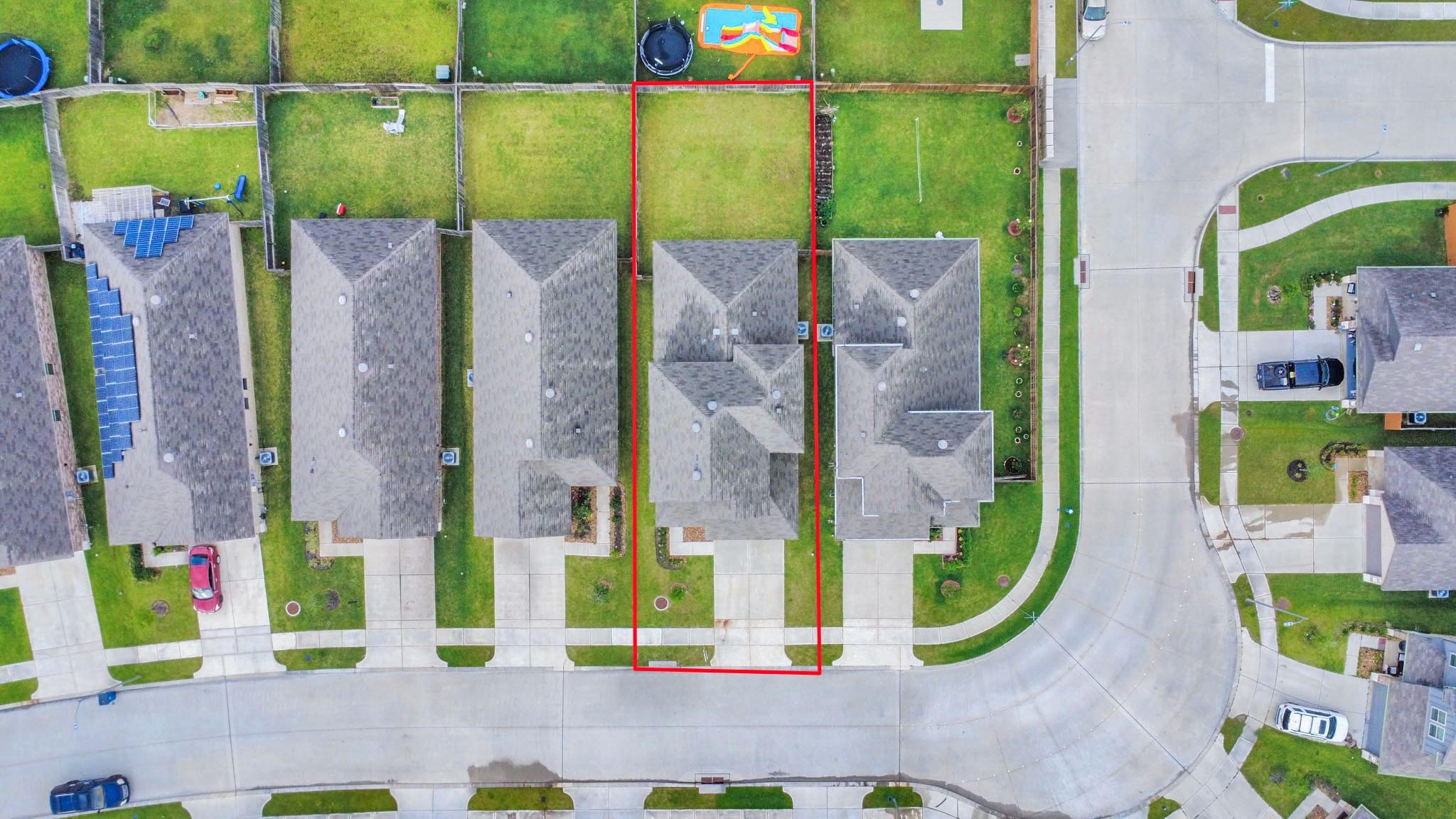22619 Goose Pasture Lane Spring, TX 77373 - Photo 13 of 13 an aerial view of a residential apartment building with a yard and potted plants