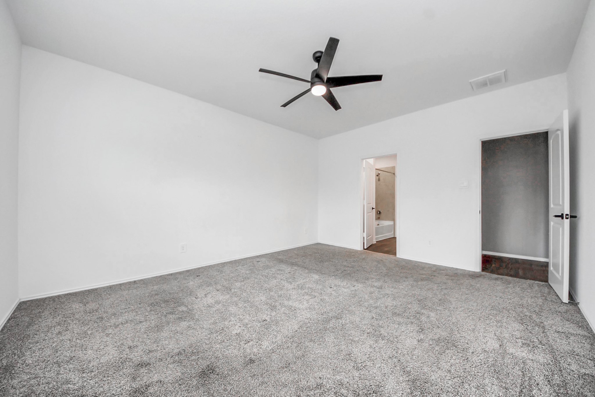 22619 Goose Pasture Lane Spring, TX 77373 - Photo 4 of 13 a view of a big room with carpet