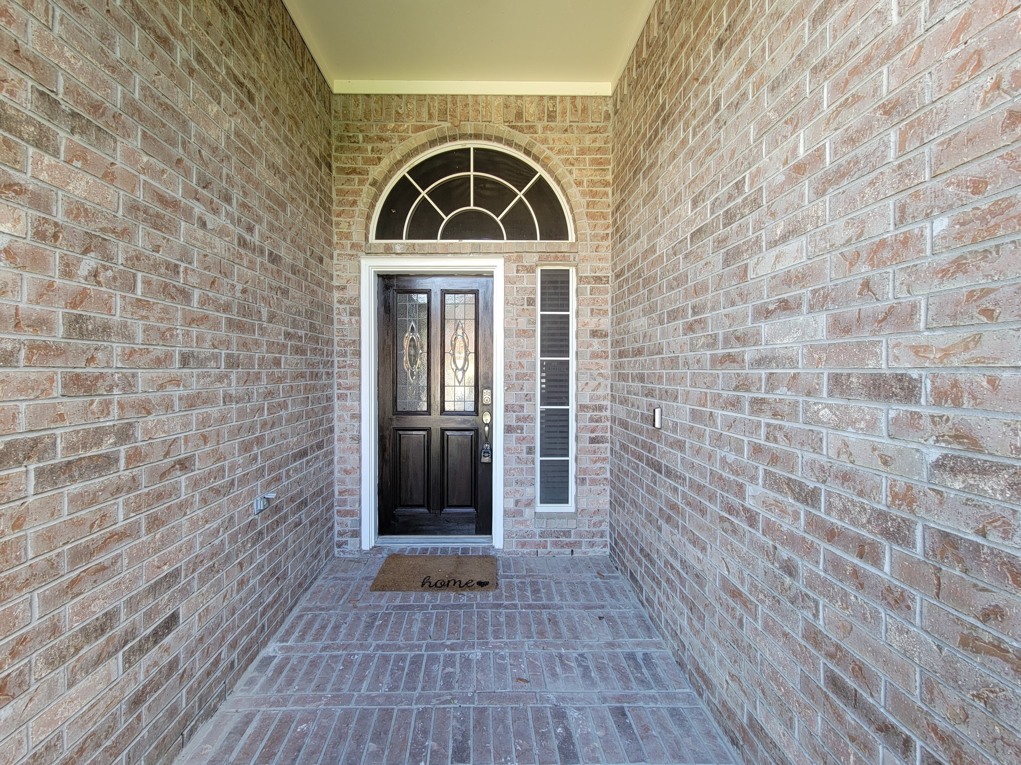 18511 Falcon Crest Drive Humble, TX 77346 - Photo 4 of 35 a view of front door of a house with wooden floor