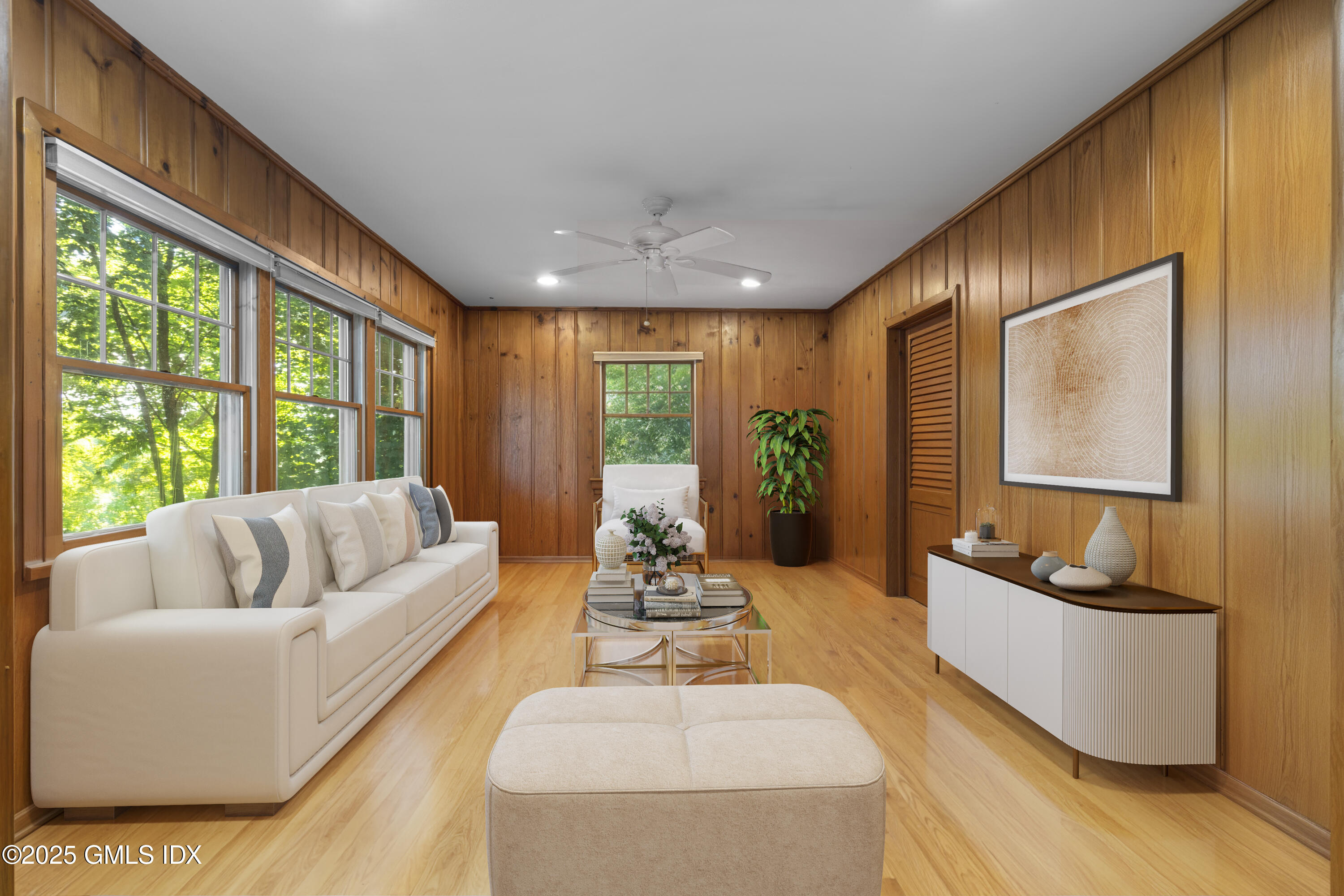 15 Ridge Road Cos Cob, CT 06807 - Photo 7 of 15 a living room with furniture and a large window
