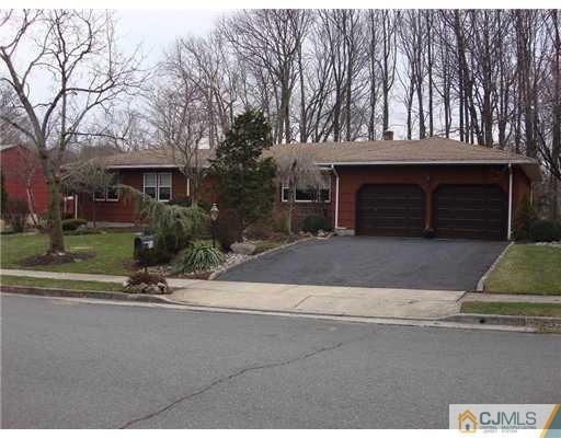 16 Fishel Road Edison, NJ 08820 - Photo 1 of 25 a view of a house with a street